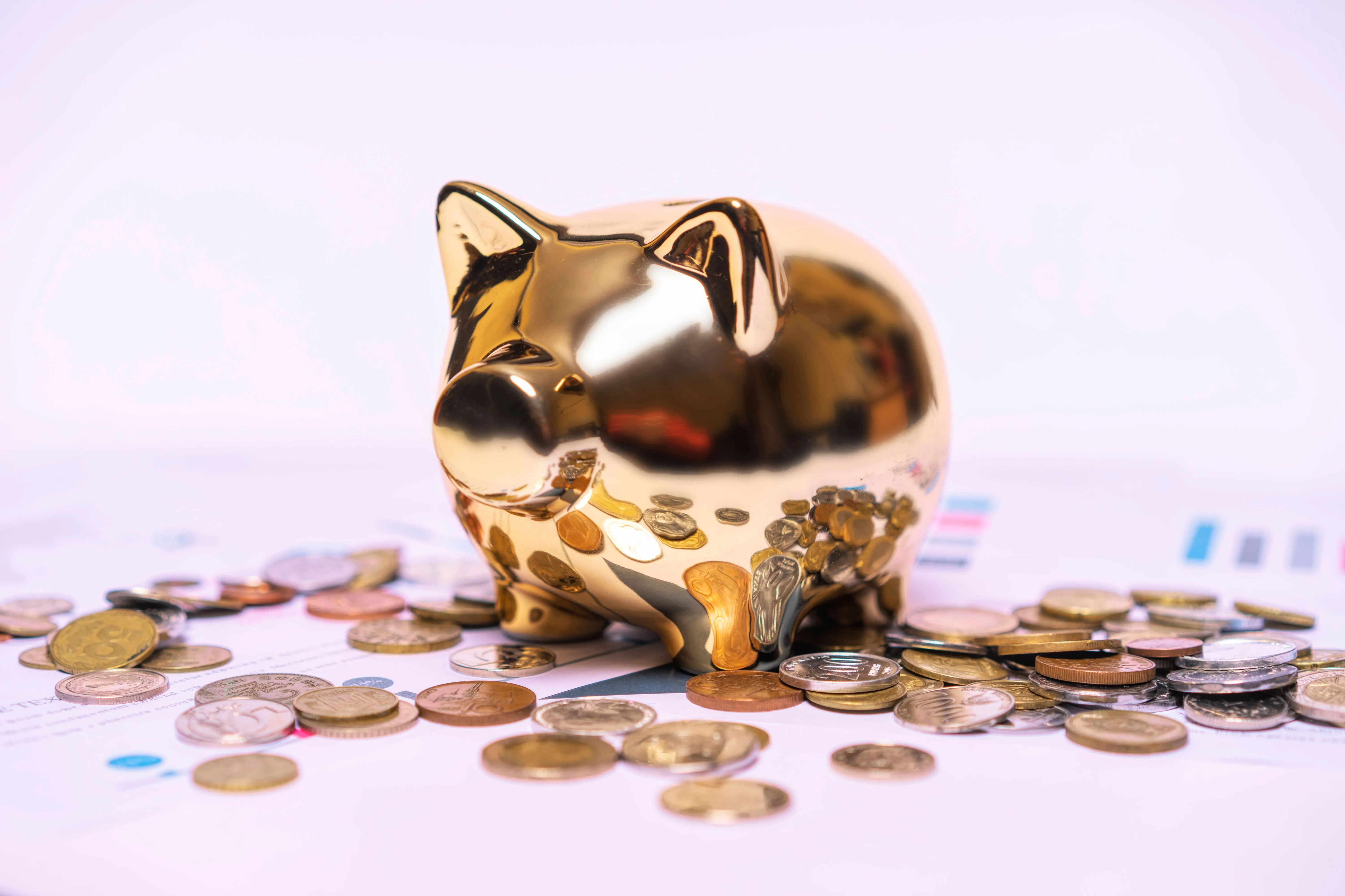 Tirelire avec pièces + monnaies